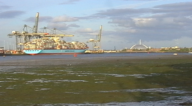Container ship unloading at port